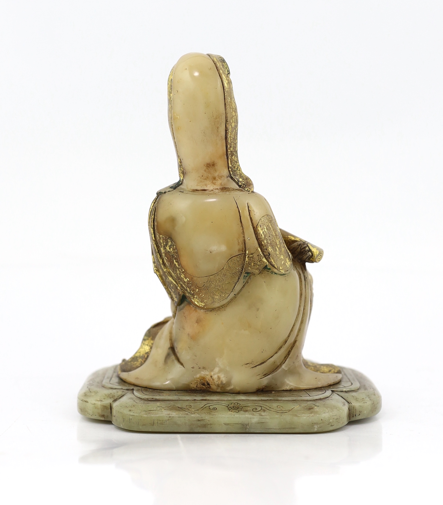 A Chinese soapstone seated figure of Guanyin, 17th/18th century